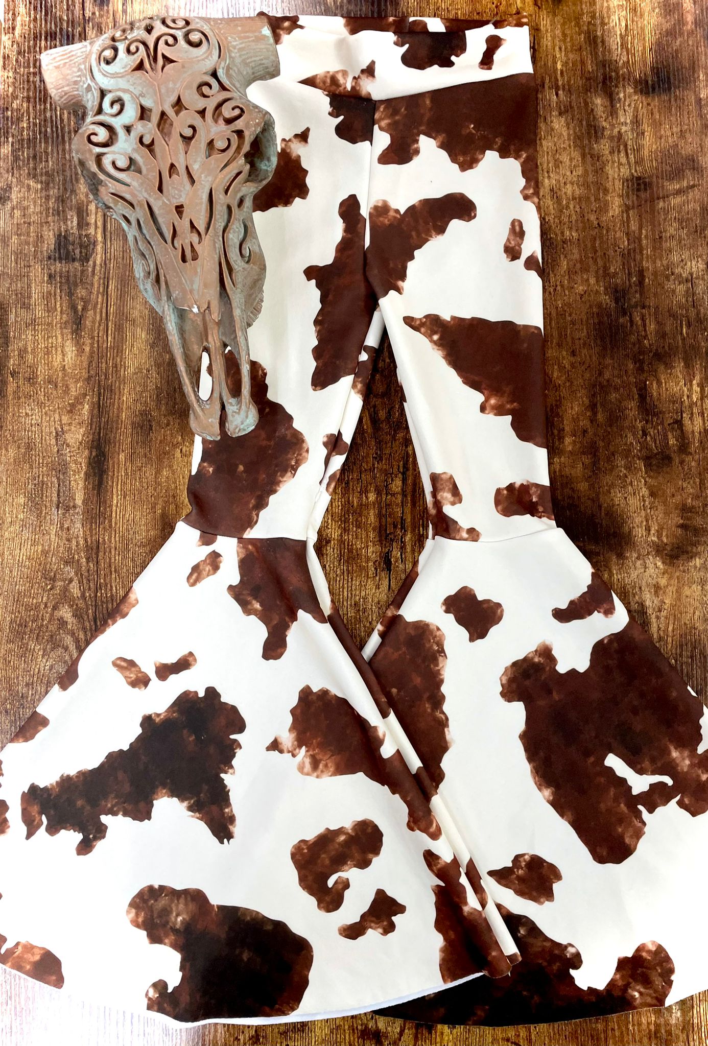 Brown Cow Print Bell Bottoms Kids - Cassie's Creekside Boutique