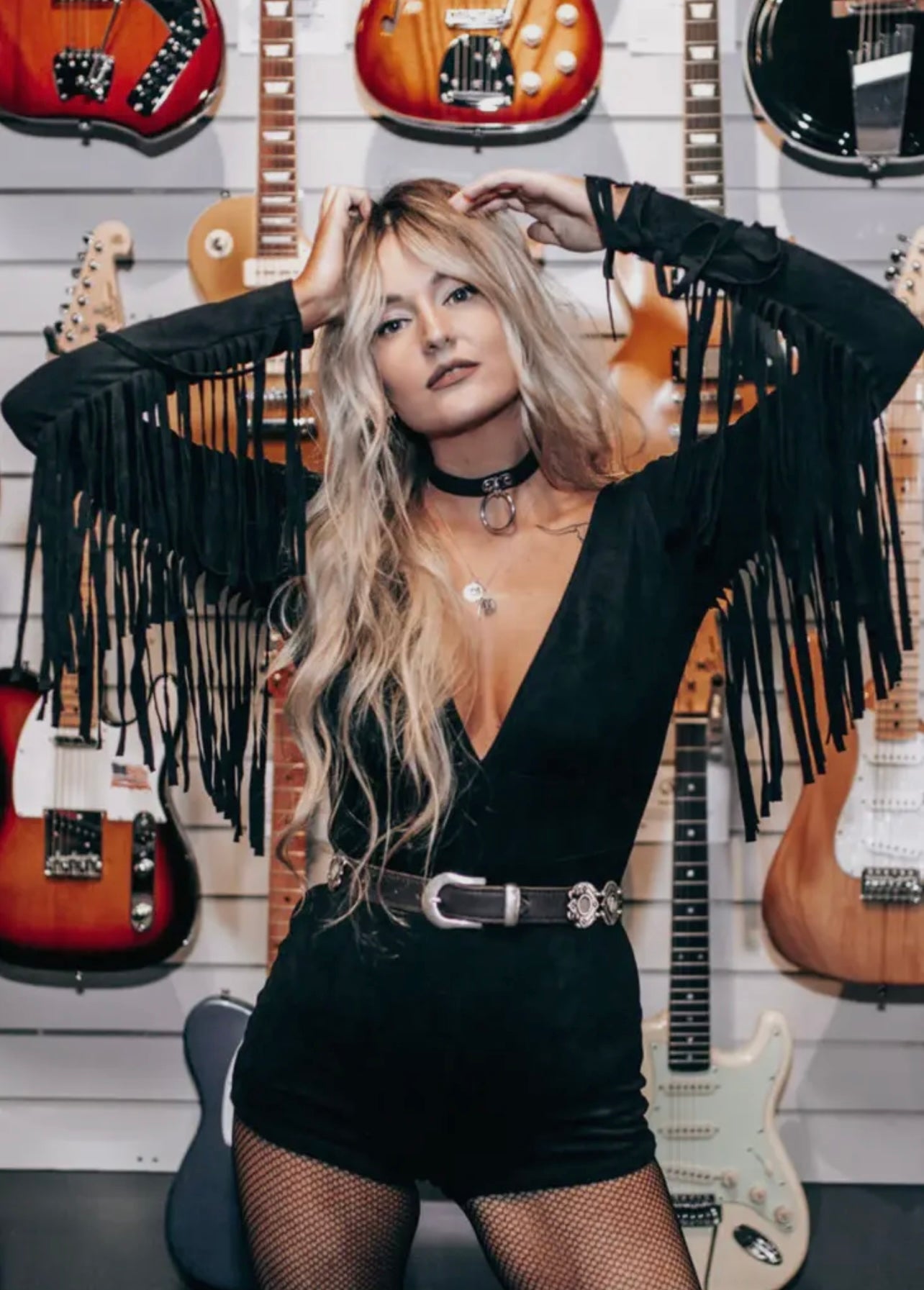 The Rolling Stone Black Suede Fringe Romper - Cassie's Creekside Boutique