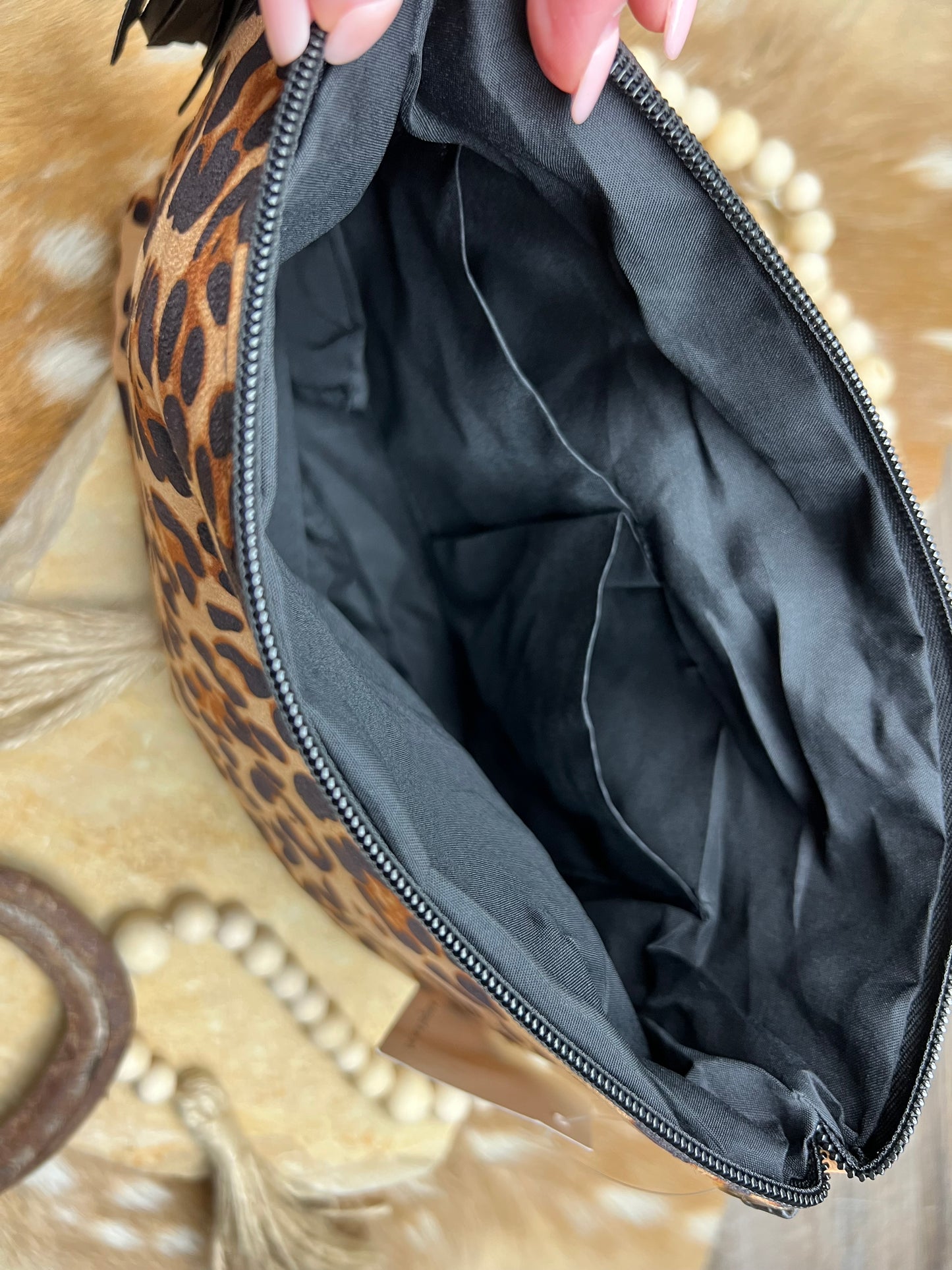 LUXE LEOPARD TASSEL CROSSBODY CLUTCH - Cassie's Creekside Boutique